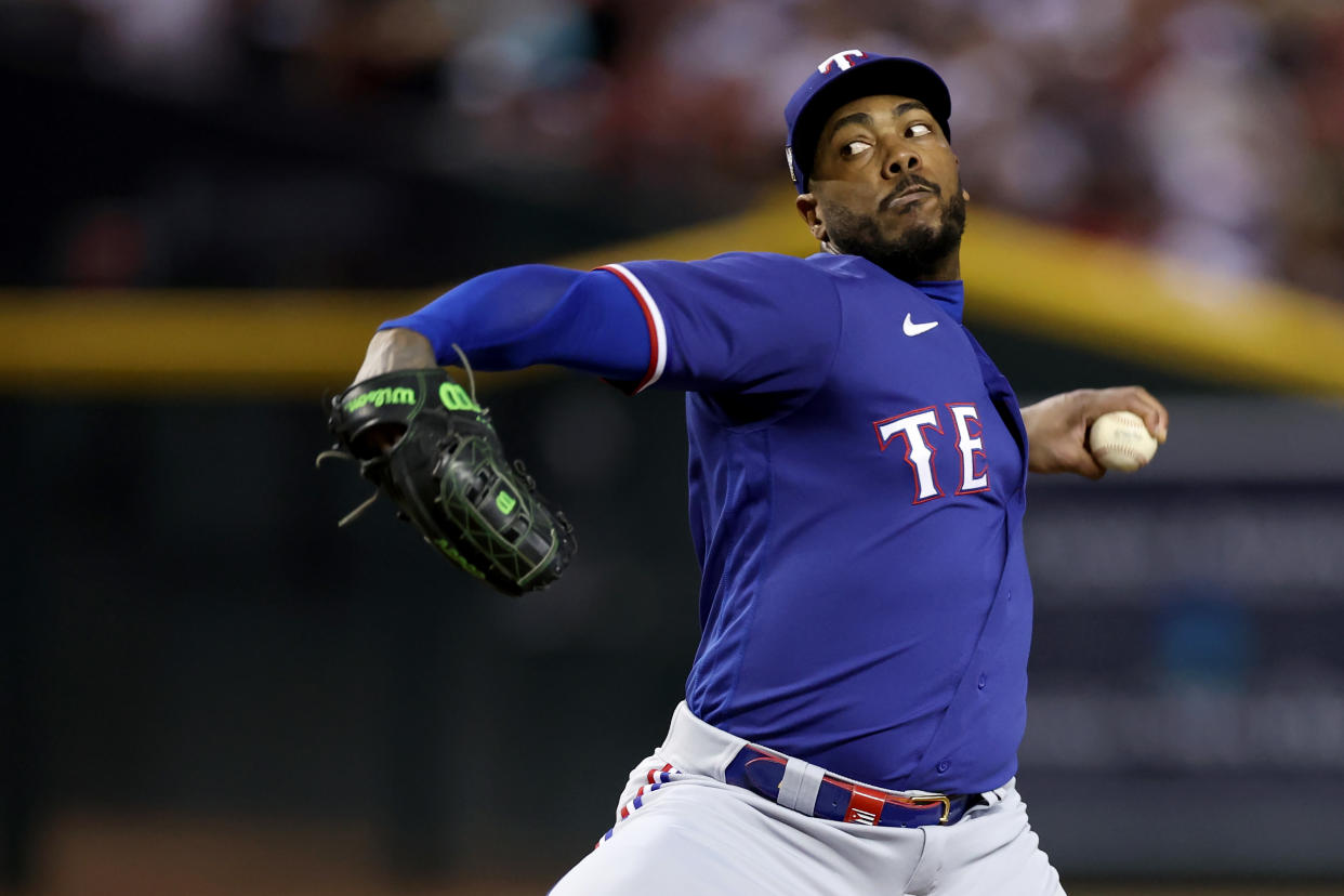 Aroldis Chapman is reportedly joining the Pirates after winning a World Series with the Rangers. (Christian Petersen/Getty Images)