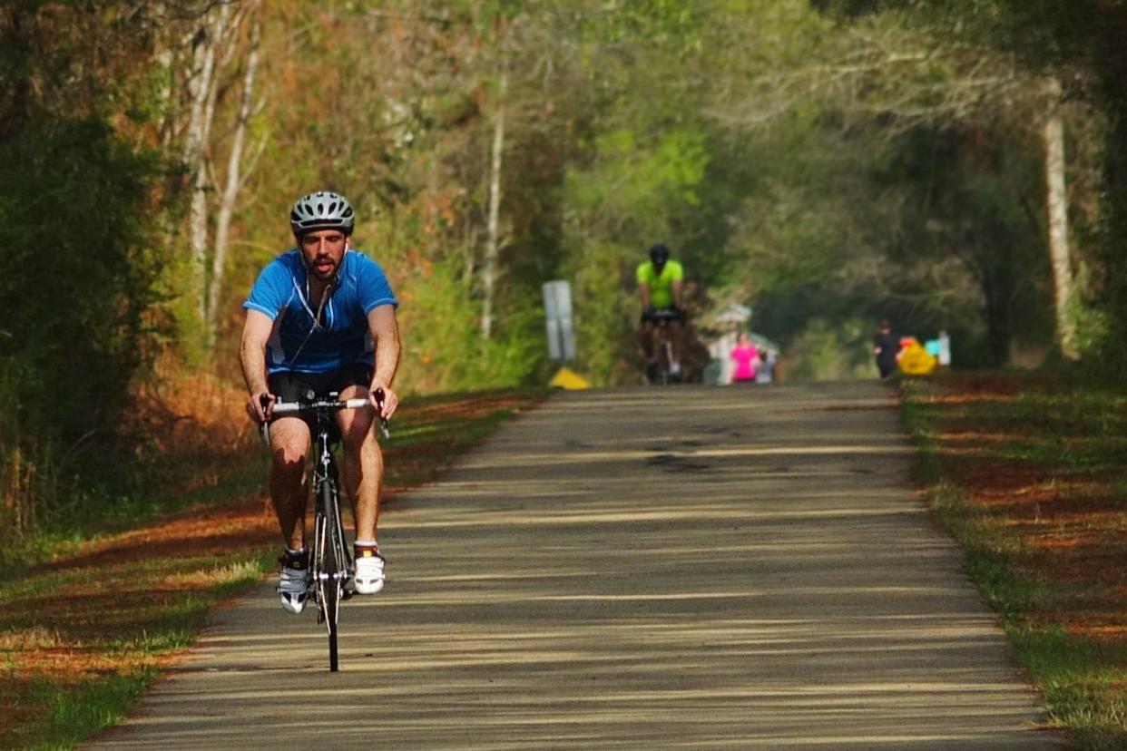 cyclist on longleaf terrace