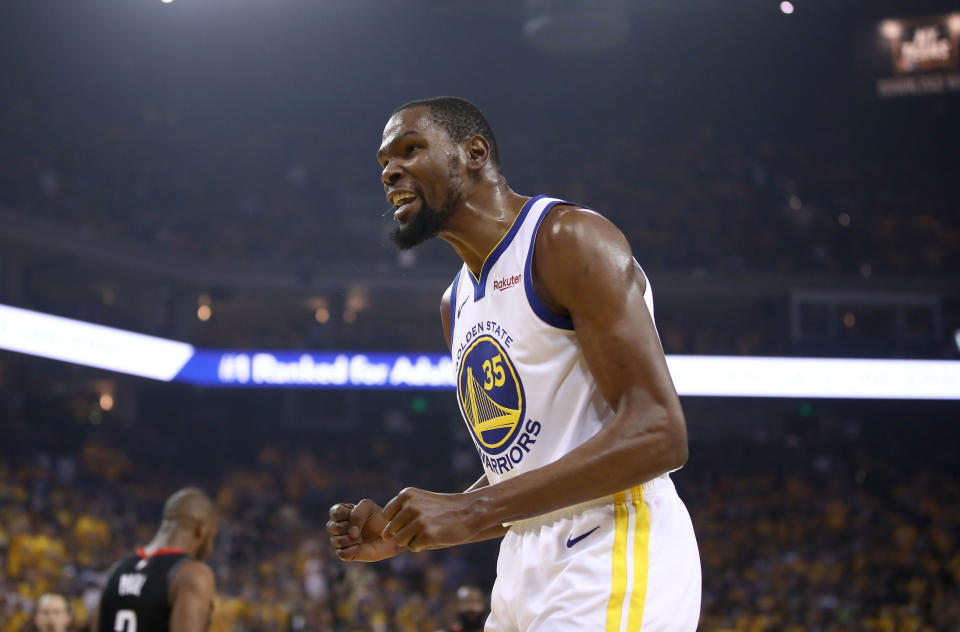 OAKLAND, CALIFORNIA - MAY 08:   Kevin Durant #35 of the Golden State Warriors reacts during their game against the Houston Rockets in Game Five of the Western Conference Semifinals of the 2019 NBA Playoffs at ORACLE Arena on May 08, 2019 in Oakland, California.  NOTE TO USER: User expressly acknowledges and agrees that, by downloading and or using this photograph, User is consenting to the terms and conditions of the Getty Images License Agreement.  (Photo by Ezra Shaw/Getty Images)