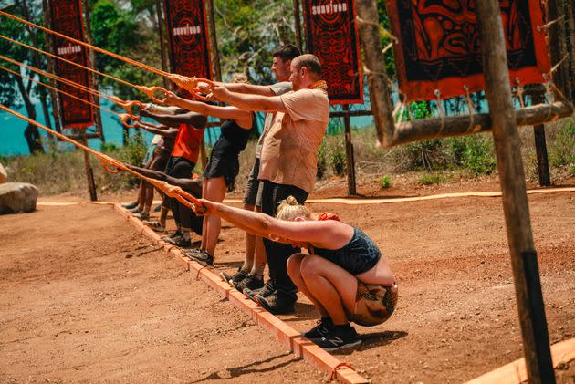 The cast of Survivor test their strength