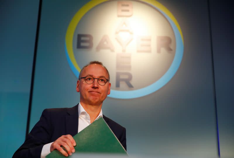 Werner Baumann, CEO of Bayer AG, arrives for the annual results news conference of the German drugmaker in Leverkusen