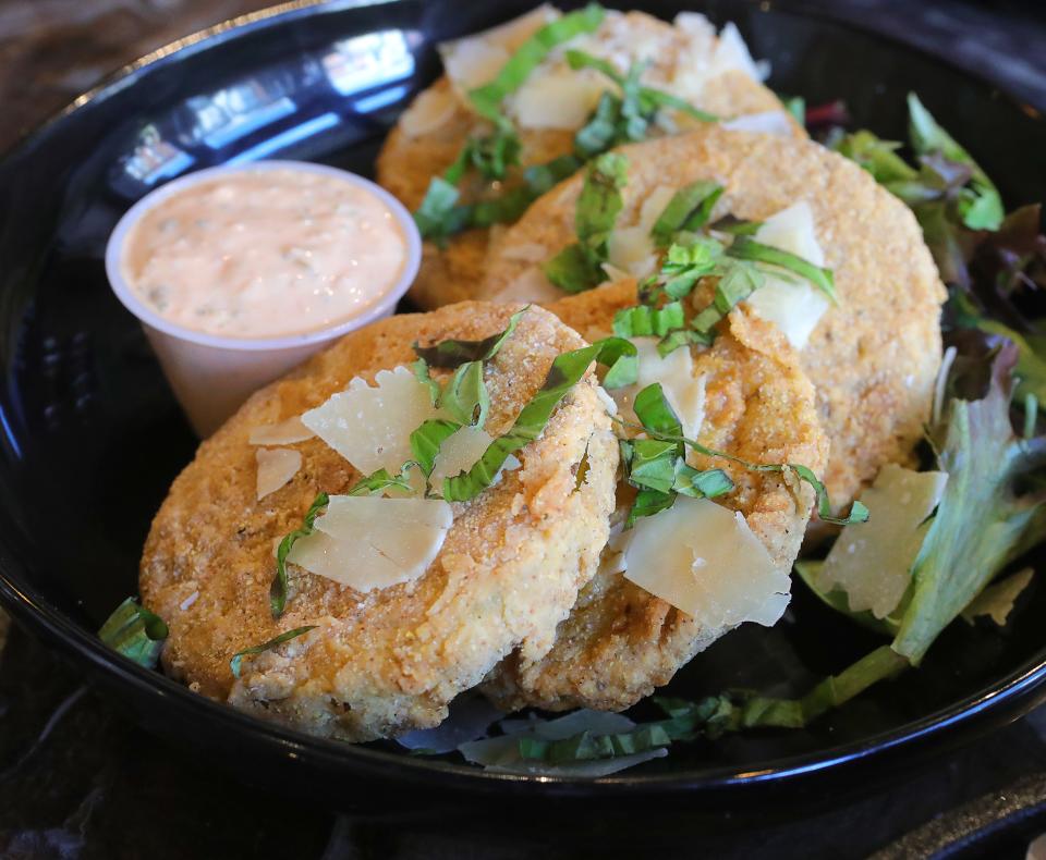 Perfect Pour's fried green tomato appetizer ($8) with shaved parmesan cheese and remoulade sauce.