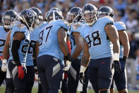Tennessee Titans defensive lineman Jeffery Simmons (98) huddles with teammates in the first half of an NFL football game against the Los Angeles Chargers Sunday, Oct. 20, 2019, in Nashville, Tenn. The game is the first for the Titans' top draft pick. (AP Photo/Mark Zaleski)