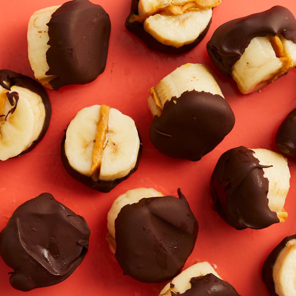 <p>These bite-size frosty morsels of frozen banana, peanut butter and vegan chocolate make a perfect low-calorie snack or easy dessert. These banana bites store well in the freezer, so make some ahead and keep them on hand for those moments you crave a taste of something sweet. <a href="https://www.eatingwell.com/recipe/265883/vegan-chocolate-dipped-frozen-banana-bites/" rel="nofollow noopener" target="_blank" data-ylk="slk:View Recipe;elm:context_link;itc:0;sec:content-canvas" class="link ">View Recipe</a></p>