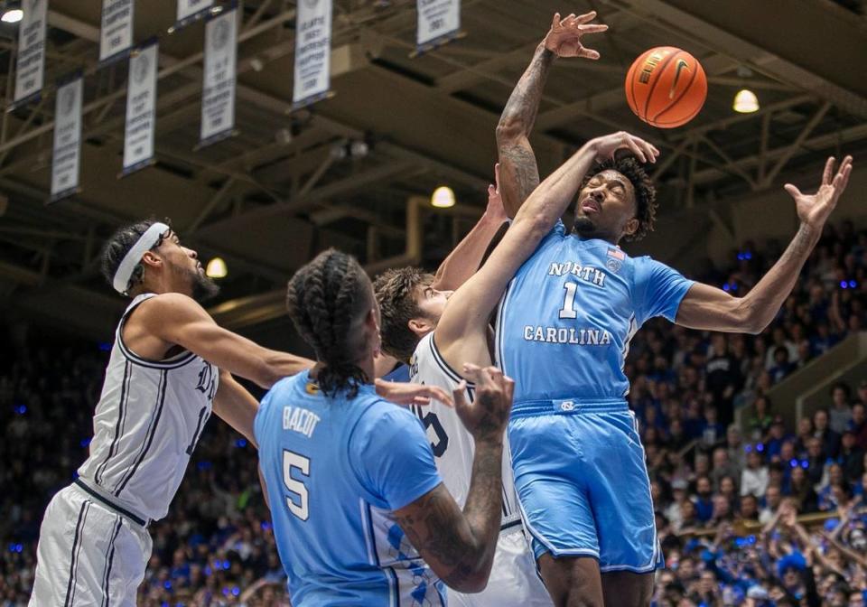 Duke’s Ryan Young (15) battles for a rebound with North Carolina’s Leaky Black (1) during the first half on Saturday, February 4, 2023 at Cameron Indoor Stadium in Durham, N.C.