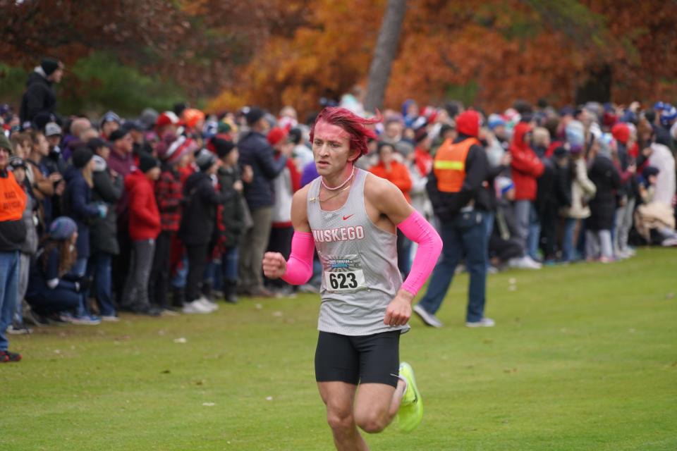 Muskego's Diego Serraino sprints to his ninth-place finish in the WIAA Division 1 boys state cross country meet Saturday at The Ridges Golf Course in Wisconsin Rapids.