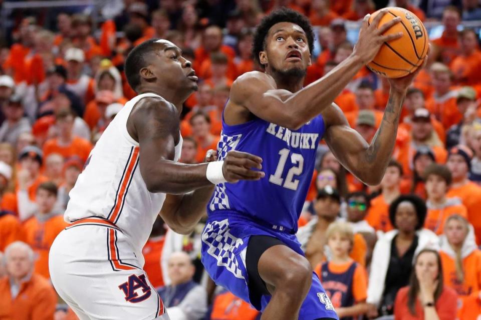 Kentucky Wildcats forward Keion Brooks Jr. (12) goes up against Auburn Tigers forward Jaylin Williams (2) during a game at Auburn Arena in Auburn, Ala., Saturday, Jan. 22, 2022.