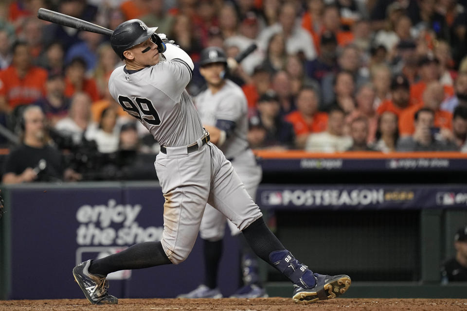 New York Yankees center fielder Aaron Judge (99) flys out during the eighth inning in Game 2 of baseball's American League Championship Series between the Houston Astros and the New York Yankees, Thursday, Oct. 20, 2022, in Houston. (AP Photo/Eric Gay)