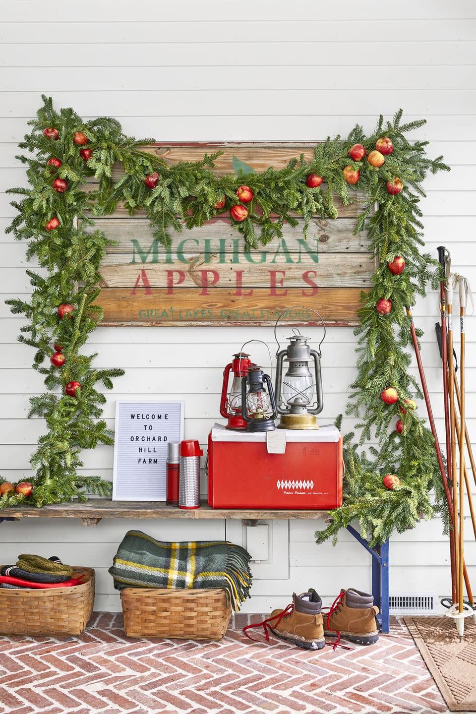 <p>Sure, it may be holly berry season, but apples still deserve their time to shine. Scatter real or faux McIntosh apples throughout garland for an unexpected accent. </p>