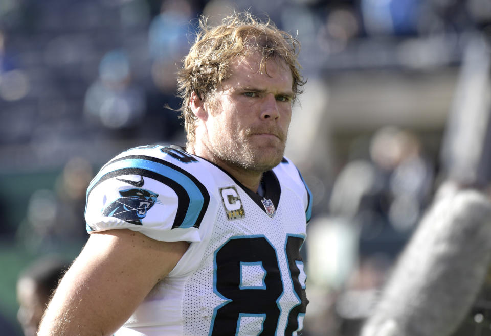 Greg Olsen will be back with Carolina for two more years. (AP)