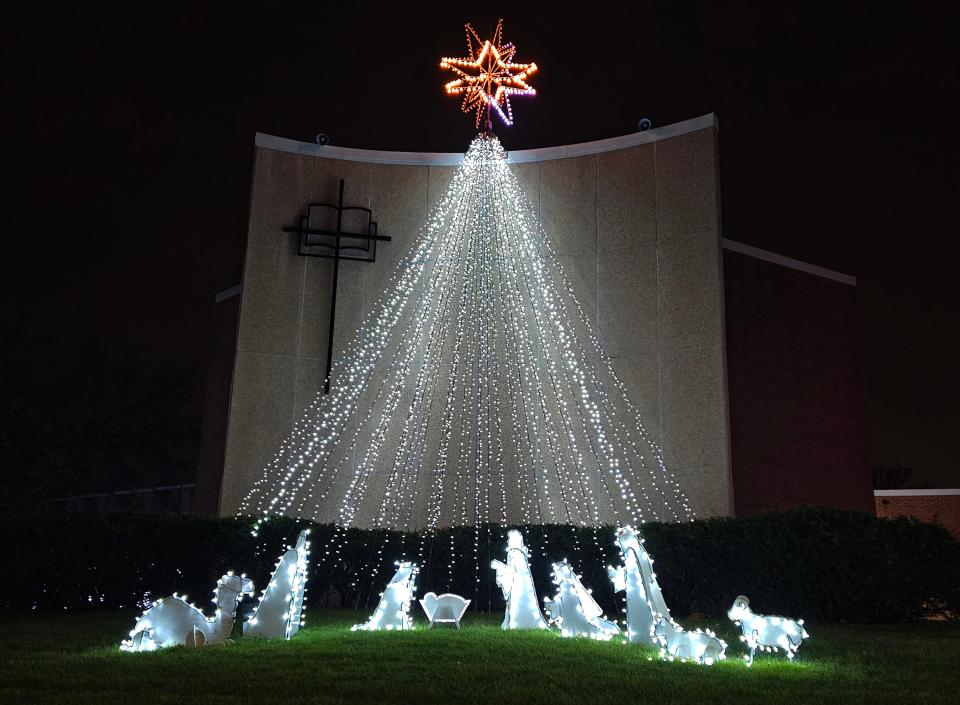 The holiday lights at First Church of the Open Bible in the Beaverdale neighborhood of Des Moines are coordinated with music.