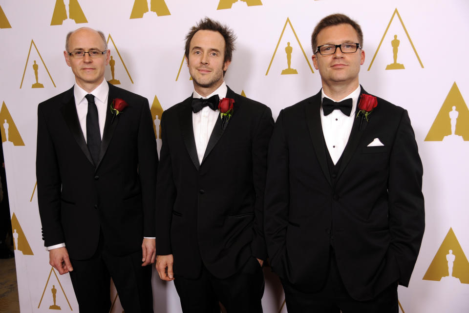 Left to right, Dan Piponi, Olivier Maury and Ian Sachs, creators of the ILM Plume system that simulates and renders fire, smoke and explosions for motion picture visual effects and recipients of a Technical Achievement Award, pose together at the Academy of Motion Picture Arts and Sciences' annual Scientific and Technical Awards on Saturday, Feb. 15, 2014, in Beverly Hills, Calif. (Photo by Chris Pizzello/Invision/AP)