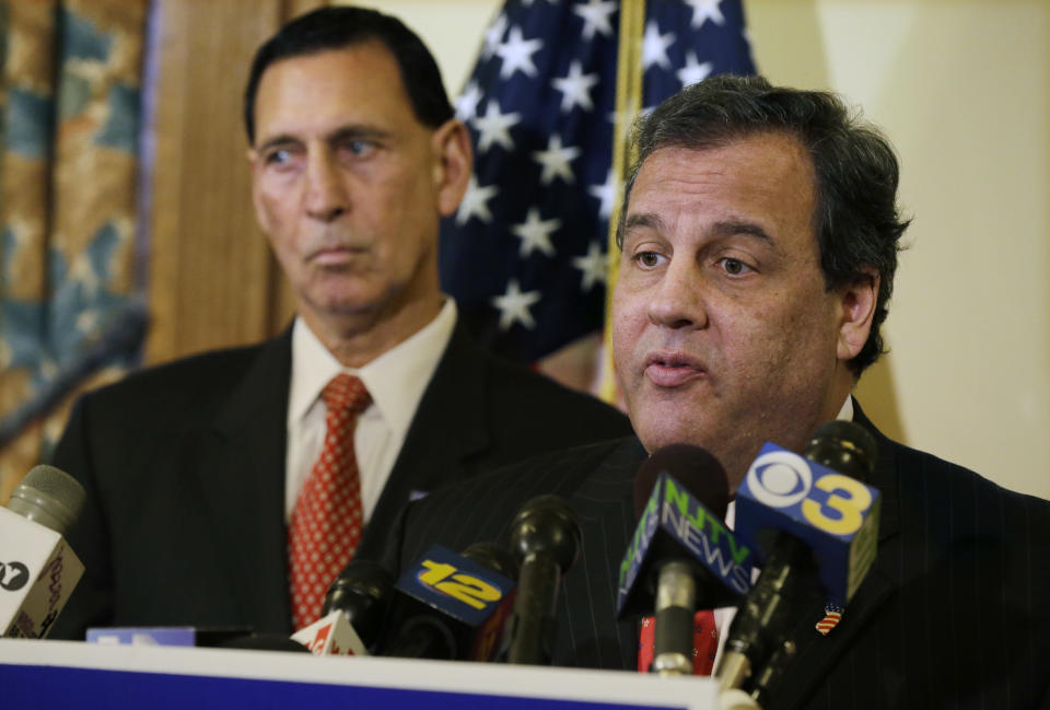 Rep. Frank LoBiondo, left, listens at the Statehouse in Trenton, N.J., on Monday, Jan. 6, 2014, as Gov. Chris Christie endorses his re-election bid. LoBiondo represents the 2nd Congressional District, which includes the state's southernmost counties of Atlantic, Cape May, Cumberland and Salem. The 67-year-old, 10-term congressman, has voted to ban gay marriage and limit access to abortion, and he also faces potential fallout in his Democratic-leaning district for last year's government shutdown. (AP Photo/Mel Evans)