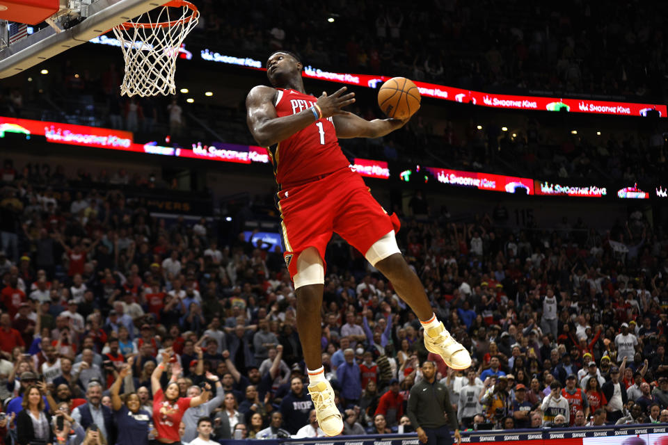 NEW ORLEANS, LOUISIANA - DECEMBER 09: Zion Williamson #1 of the New Orleans Pelicans dunks the ball during the fourth quarter of an NBA game against the Phoenix Suns at Smoothie King Center on December 09, 2022 in New Orleans, Louisiana. NOTE TO USER: User expressly acknowledges and agrees that, by downloading and or using this photograph, User is consenting to the terms and conditions of the Getty Images License Agreement. (Photo by Sean Gardner/Getty Images)