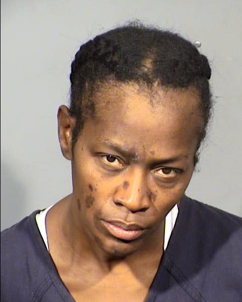 <em>A booking photo of Vanessa Harvey after her arrest on Nov. 8, 2021. She was initially charged with murder and attempted murder. She later agreed to a plea deal on a voluntary manslaughter charge.</em>