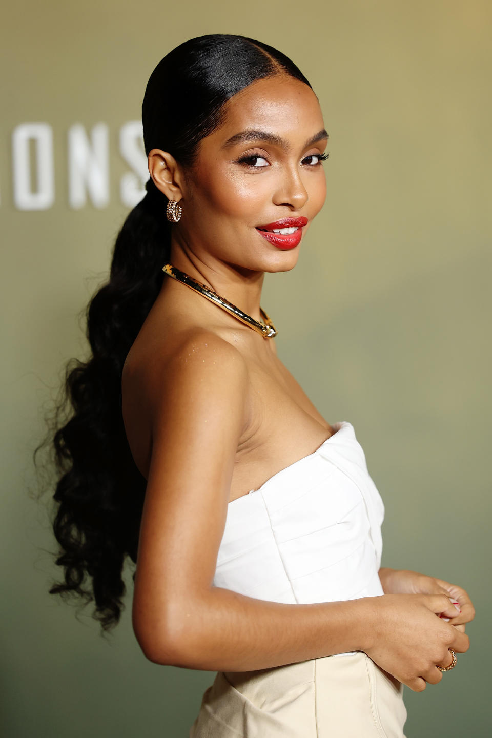 Yara Shahidi wearing red lipstick