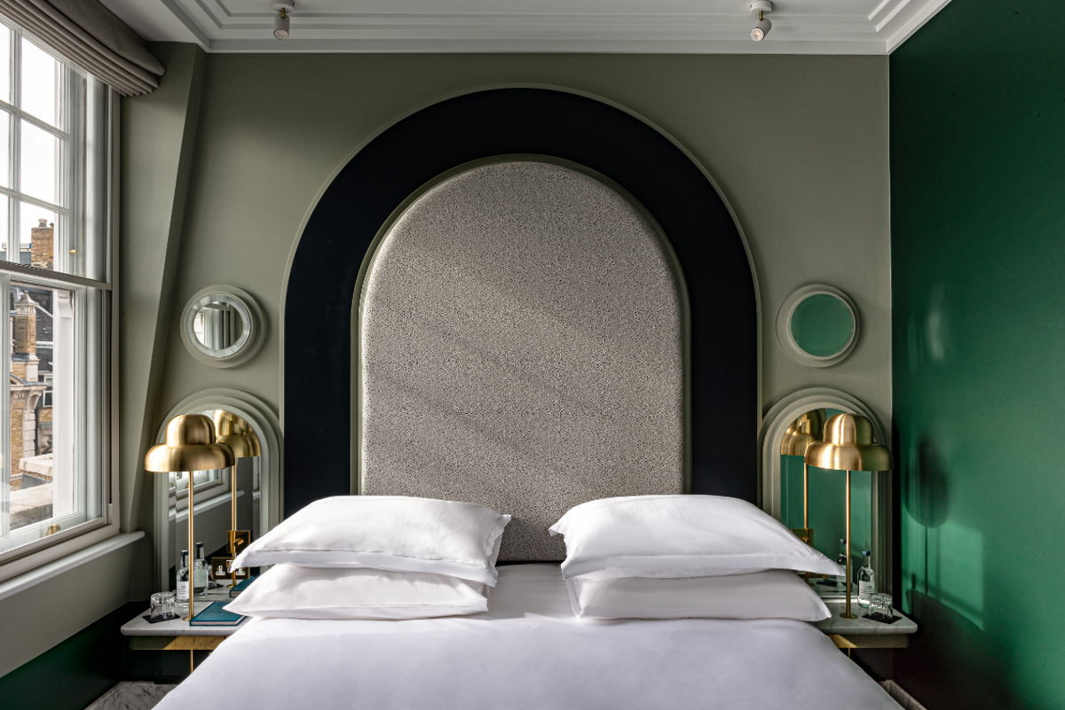 You'll find hand painted wallpaper, marble details and upholstered headboards at Henrietta (Henrietta Hotel)