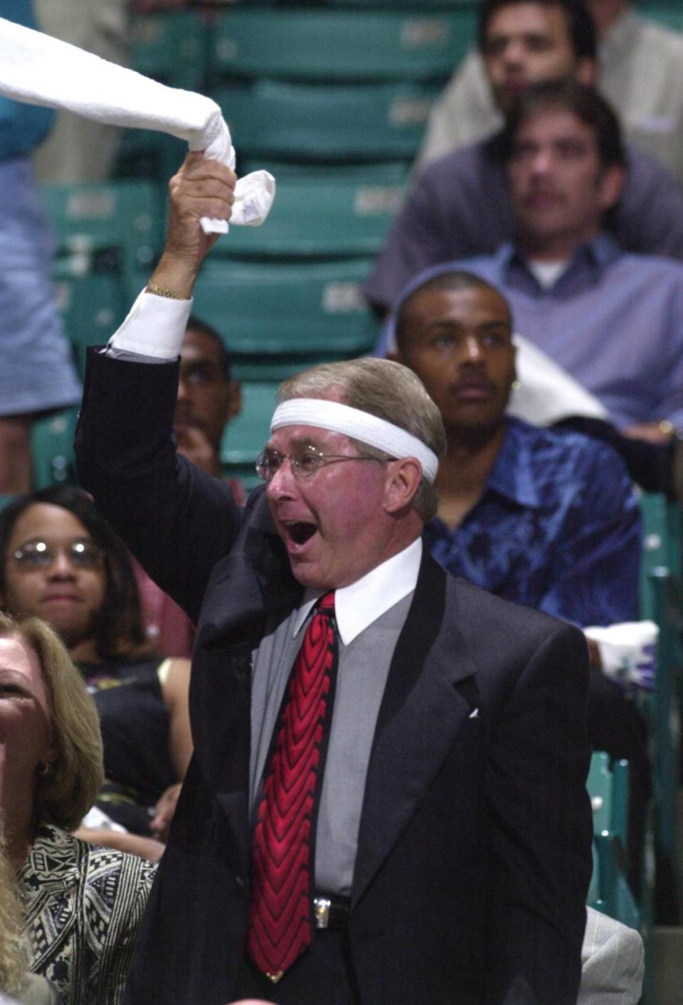 In 2001, George Shinn wore a headband during a Charlote Hornets playoff game.