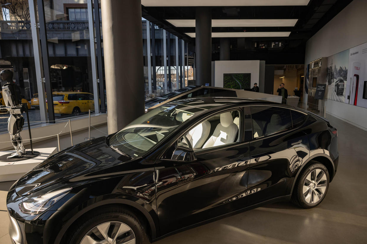 A Tesla Model Y electric vehicle at the company's showroom in the Meatpacking District of N.Y. on Friday, Jan. 5, 2024.  ( Yuki Iwamura / Bloomberg via Getty Images)