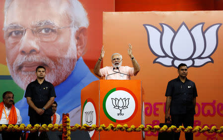 India's Prime Minister Narendra Modi addresses an election campaign rally ahead of the Karnataka state assembly elections in Bengaluru, India, May 8, 2018. REUTERS/Abhishek N. Chinnappa