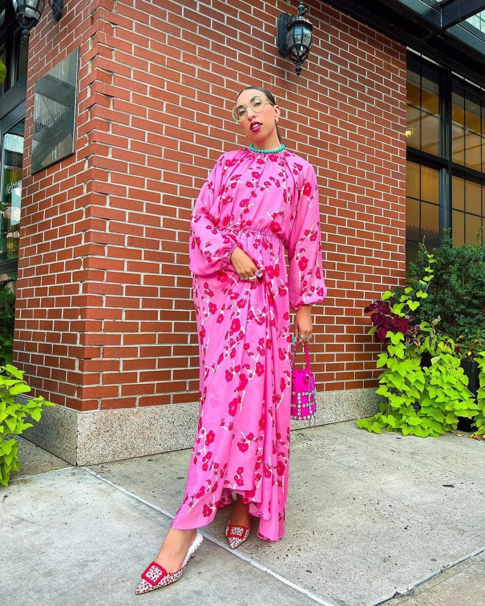 what to wear easter sunday caroline vazzana wearing a long sleeve pink floral maxi dress