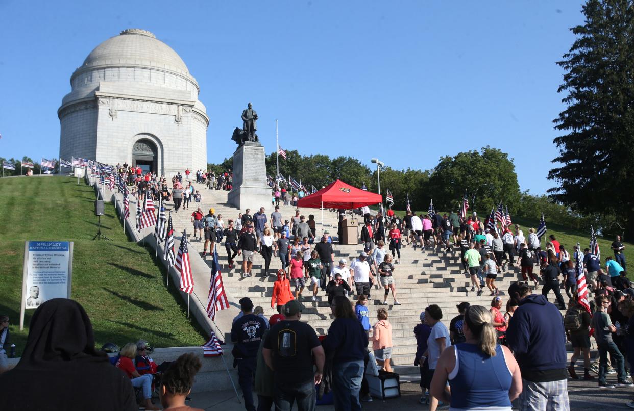 Participants of the Memorial Climb ascend the steps of the McKinley Presidential Library & Museum in Canton on Saturday, Sept. 11, 2021. The event marked the 20th anniversary of the 911 attacks and recalled the memory of the 343 Firefighters that lost their lives that day.