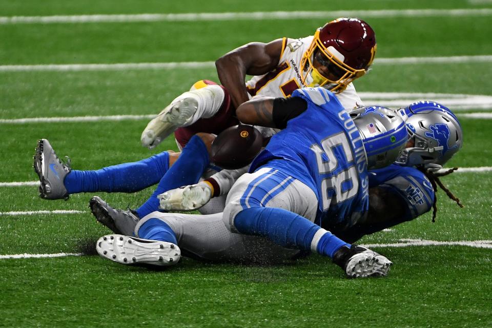 Terry McLaurin of the Washington Football Team is tackled by Jamie Collins of the Detroit Lions at Ford Field on Nov. 15, 2020 in Detroit.