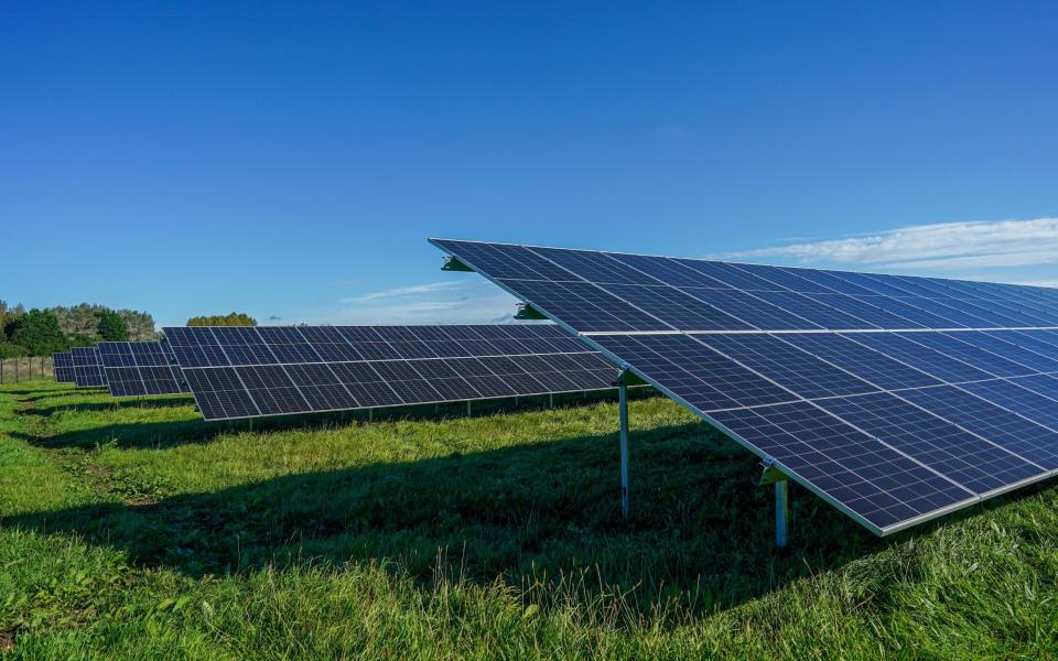 Solar Panels Against A Blue Sky