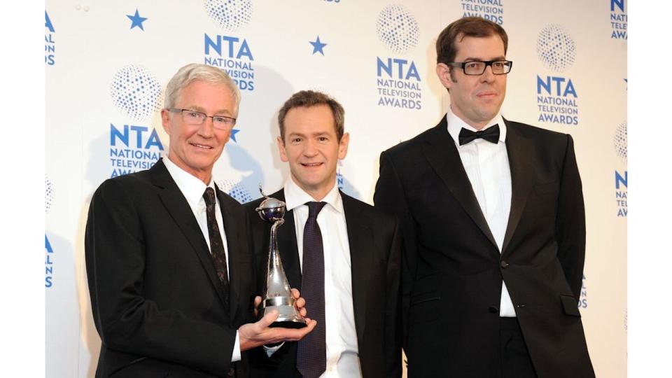 people at national television awards holding award