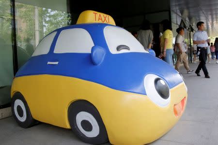 A mascot of Didi Chuxing is seen at the company's headquarters in Beijing, China, May 18, 2016. REUTERS/Kim Kyung-Hoon/File Photo