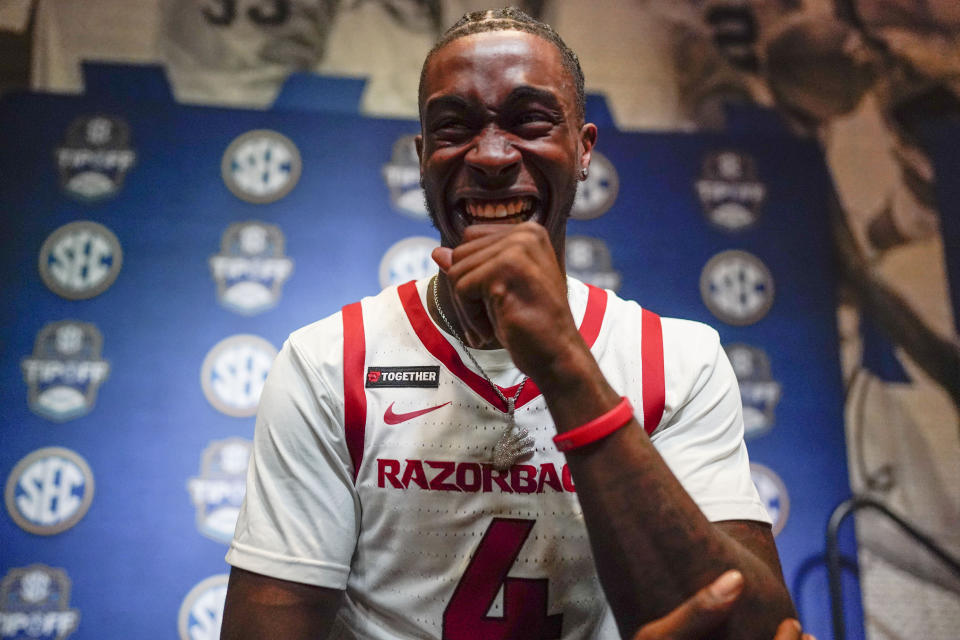 Arkansas NCAA college basketball player Davonte Davis speaks during Southeastern Conference Media Days, Wednesday, Oct. 18, 2023, in Birmingham, Ala. (AP Photo/Mike Stewart)