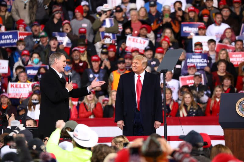 Senator David Perdue addresses a crowd as U.S. President Donald Trump hosts a campaign event with U.S. Republican Senators David Perdue and Kelly Loeffler at Valdosta Regional Airport in Valdosta, Georgia