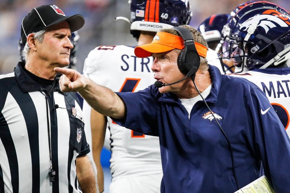 Denver Broncos head coach Sean Payton talks to a referee during the second half against the Detroit Lions at Ford Field in Detroit on Saturday, Dec. 16, 2023.