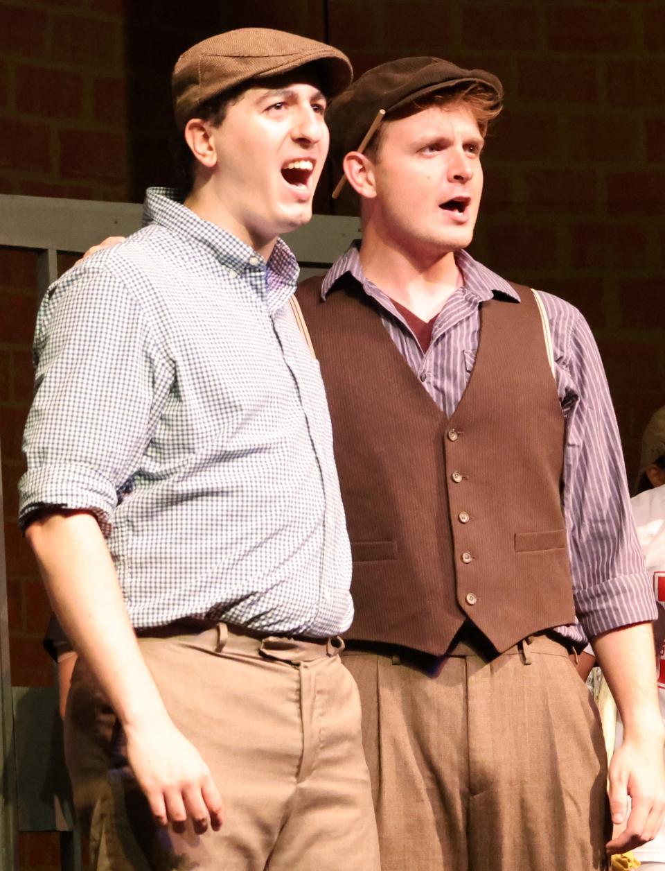 Thomas Morelli as Danny and Mitchell Sharp as Jack Kelly perform in 'Newsies the Musical' at New Castle Playhouse.