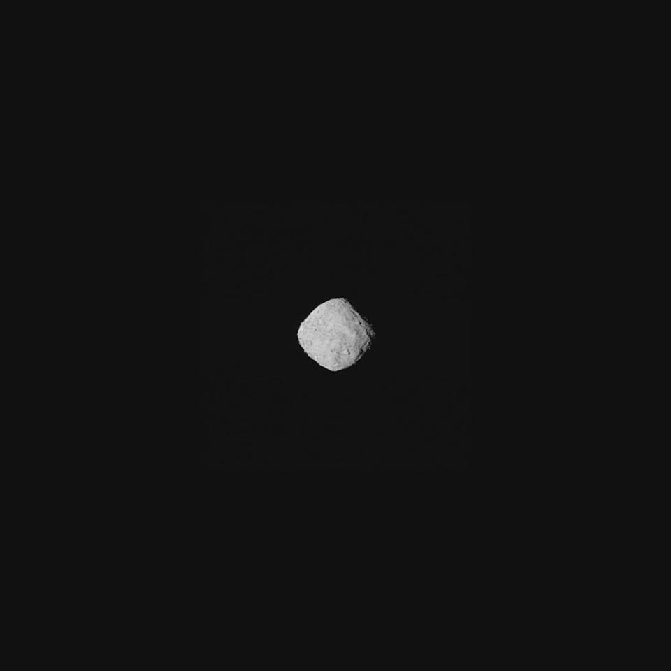 The asteroid Bennu, as seen by NASA's OSIRIS-REx spacecraft from a distance of about 205 miles, on Oct. 29, 2018. <cite>NASA/Goddard/University of Arizona</cite>