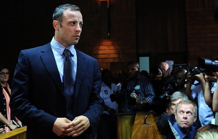 South African Paralympic icon and murder suspect Oscar Pistorius appears at court in Pretoria on February 22, 2013. Pistorius on Saturday said he was thankful for prayers offered to his family and that of his slain girlfriend, a day after he was freed on bail