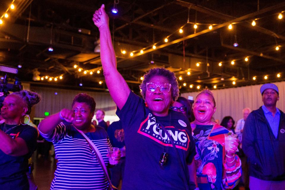 Delois Williamson, a Paul Young supporter, cheers after early voting results for mayor are projected onto a screen showing Young in the lead at an election watch party for Young at Minglewood Hall in Memphis, Tenn., on Thursday, October 5, 2023.