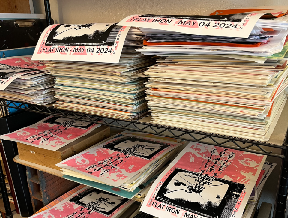 Freshly printed posters for an upcoming concert sit on a drying rack inside Ron Liberti’s studio in Wilson. Liberti has been creating posters for North Carolina music venues for more than three decades. His specialty is screenprinting. Lucas Thomae/UNC Media Hub