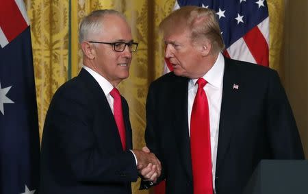 U.S. President Donald Trump shakes hands with Australian Prime Minister Malcolm Turnbull (L) at the conclusion of their joint news conference at the White House in Washington, U.S., February 23, 2018. REUTERS/Jonathan Ernst