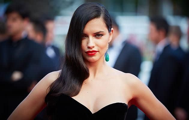 Adriana Lima uses this supermarket product to get her luscious locks. Photo: Getty.