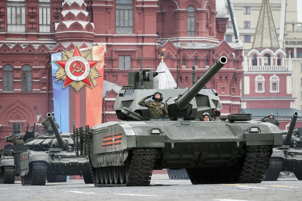 FILE - A Russian Armata tank, foreground rolls along Red Square during a rehearsal for the Victory Day military parade in Moscow, Russia, Sunday, May 6, 2018. An independent Sweden-based watchdog says the world military spending has grown for the eighth consecutive year in 2022 to an all-time high of $2240 billion leading to a sharp rise of 13% taking place in Europe, chiefly due to Russian and Ukrainian expenditure. (AP Photo/Alexander Zemlianichenko, File)