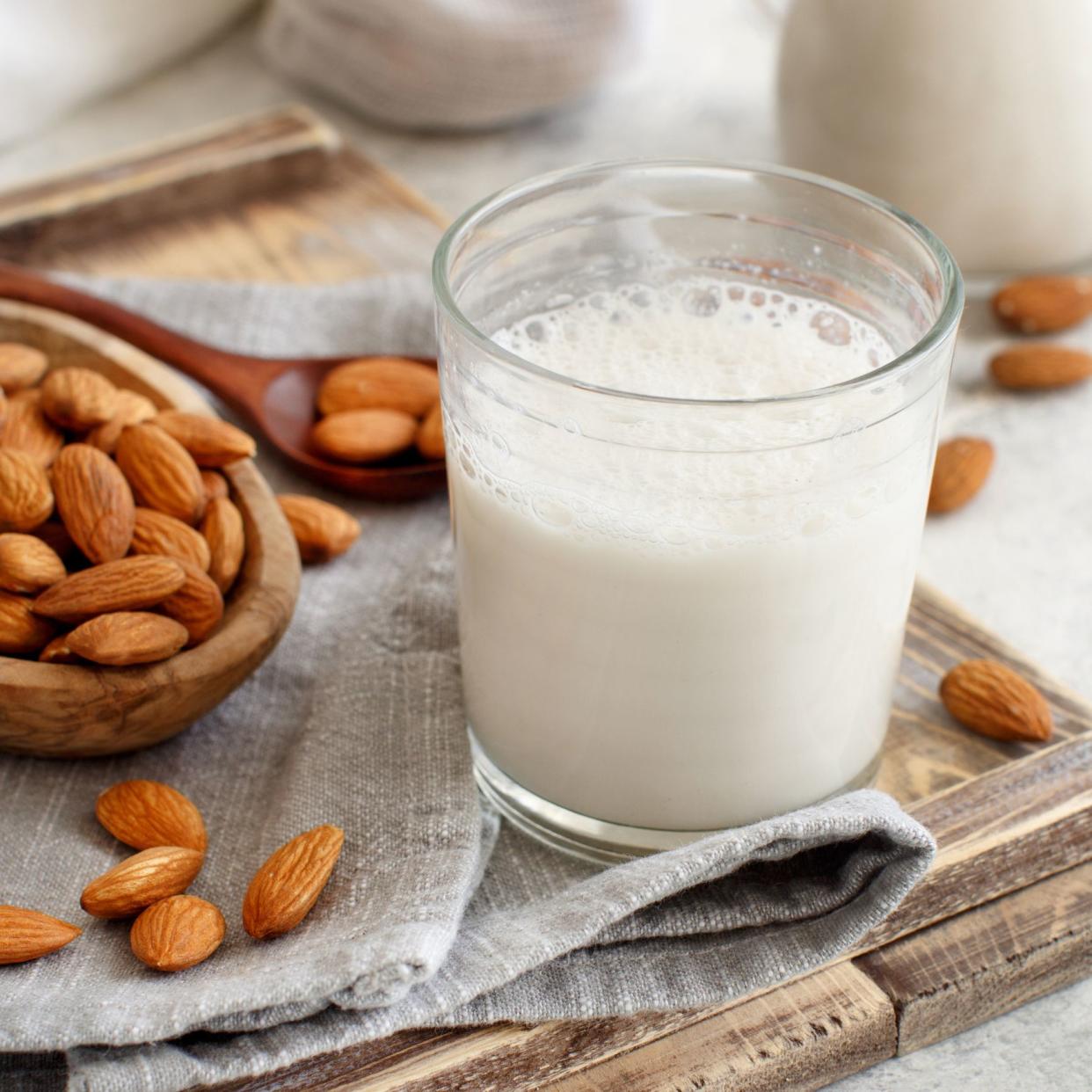 Vegan almond milk, non dairy alternative milk  in a glass close up