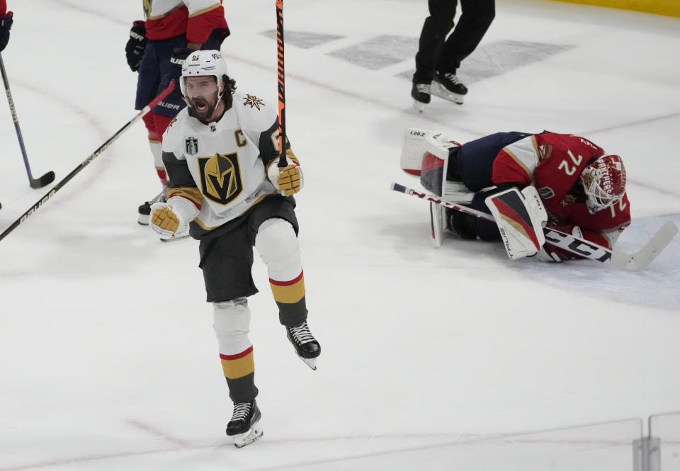 Vegas Golden Knights right wing Mark Stone (61) celebrates after scoring a goal against Florida Panthers goaltender Sergei Bobrovsky (72) during the first period of Game 3 of the NHL hockey Stanley Cup Finals, Thursday, June 8, 2023, in Sunrise, Fla. (AP Photo/Rebecca Blackwell)