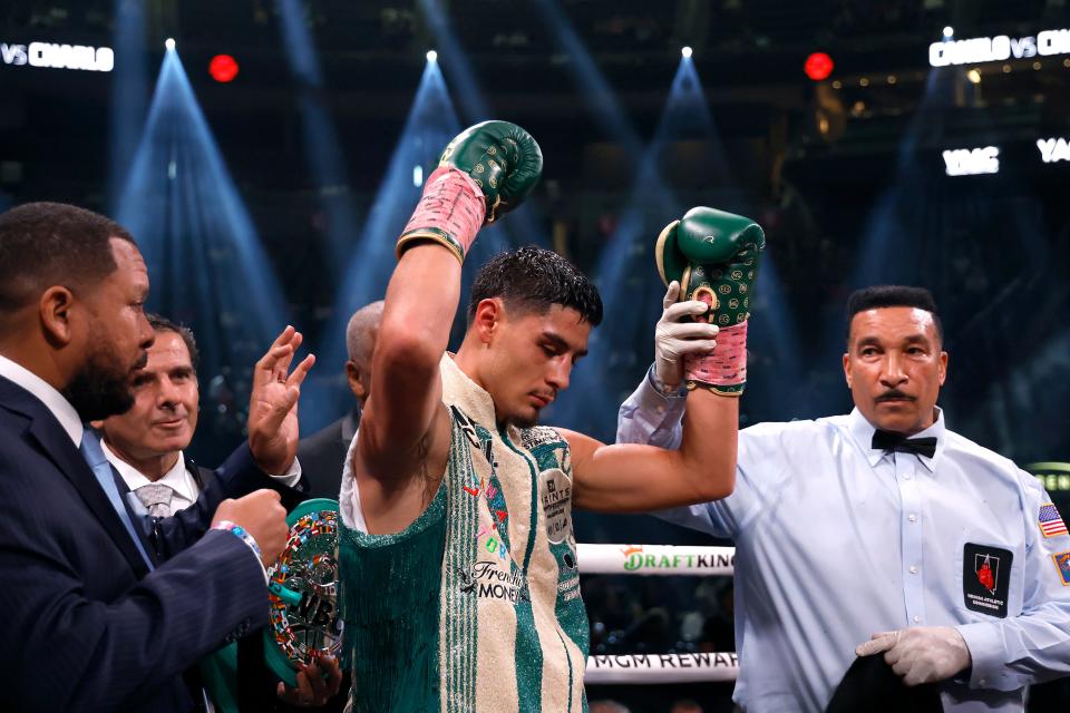 Elijah Garcia (green/tan trunks) reacts after defeating Armando Resendiz of Mexico in the eighth round of their middleweight fight at T-Mobile Arena on Sept. 30, 2023, in Las Vegas, Nevada.