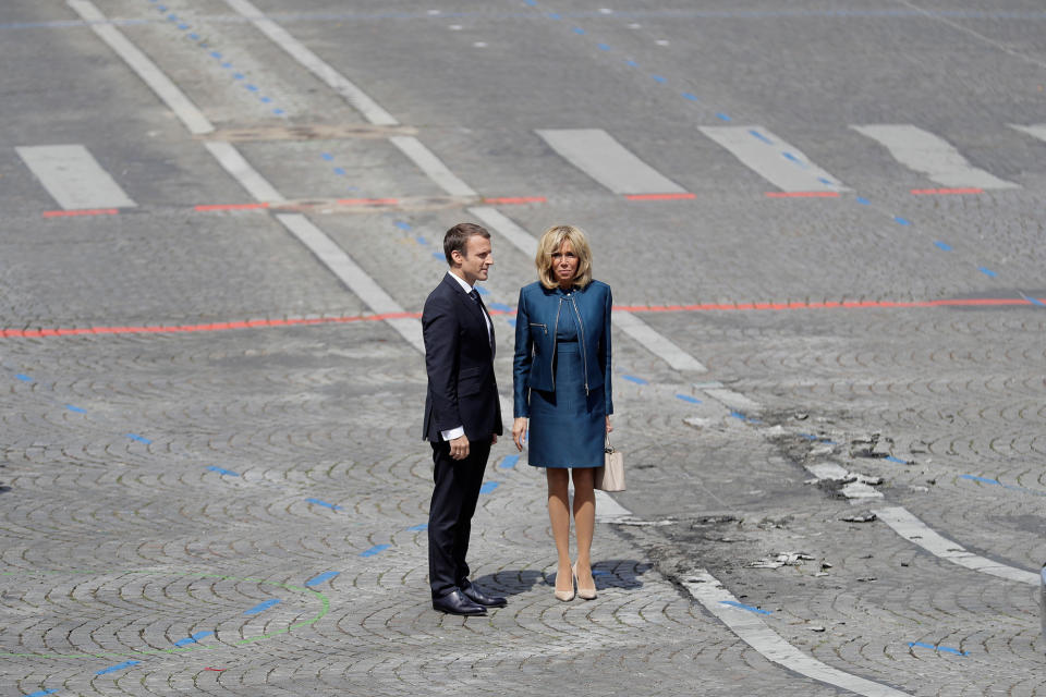<p>French President Emmanuel Macron and his wife Brigitte watch President Donald Trump and First Lady Melania leaving after the Bastille Day parade in Paris, Friday, July 14, 2017. (Photo: Markus Schreiber/AP) </p>