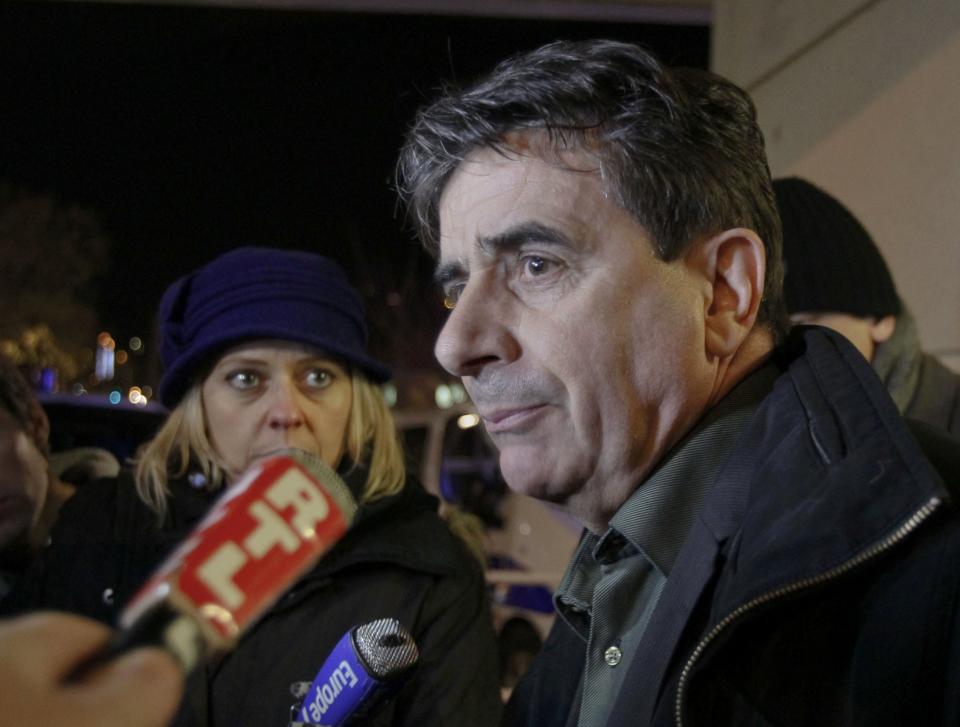 Directeur adjoint Jean Marc Grenier talks to media outside the CHU Nord hospital in Grenoble, French Alps, where retired seven-times Formula One world champion Michael Schumacher is hospitalized after a ski accident, December 29, 2013. Schumacher suffered a head injury in a fall while skiing off-piste in the French Alps resort of Meribel on Sunday, an official said. The 44-year-old German was wearing a helmet and was conscious while being transported to a local hospital before later being transferred to to a better-equipped medical unit in Grenoble for further examinations. (REUTERS/Robert Pratta)