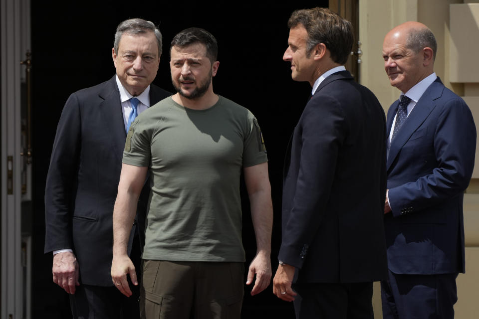 FILE - From left, Italian Prime Minister Mario Draghi, Ukrainian President Volodymyr Zelenskyy, French President Emmanuel Macron, and German Chancellor Olaf Scholz stand together before entering the Mariyinsky Palace in Kyiv, Ukraine, Thursday, June 16, 2022. It's not a summer heat wave that's making European leaders and businesses sweat. It's fear that Russia's manipulation of natural gas supplies will lead to an economic and political crisis next winter. Or, in the worst case, even sooner. (AP Photo/Natacha Pisarenko, File)