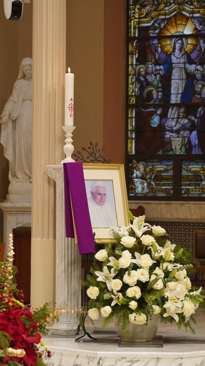 A photo of Pope Benedict XVI was on display during a celebratory Mass held at the Cathedral of Saint Peter on Jan. 4, 2023 in Scranton.
