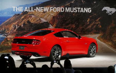 Ford Motor Co. unveils its all new 2015 Ford Mustang in Dearborn, Michigan December 5, 2013. REUTERS/Rebecca Cook