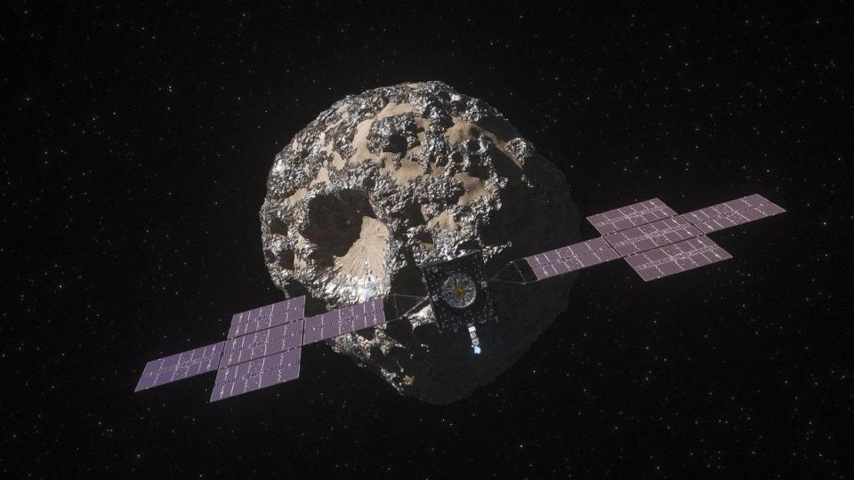 This illustration depicts NASA's Psyche spacecraft as it approaches the asteroid Psyche. Once it arrives in 2029, the spacecraft will orbit the metal-rich asteroid for 26 months while it conducts its science investigation.